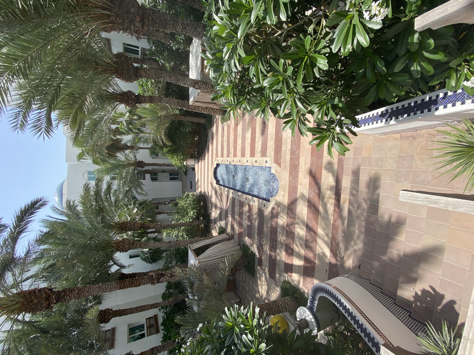 Palm-lined courtyard and fountain at Park Hyatt Dubai, photographed during my May 2021 stay